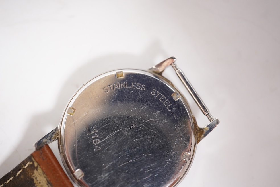 A gentleman's 1940's 9ct gold manual wind wrist watch(a.f.), together with four other wrist watches including Seiko, gold plated Girard Perregaux and Baume & Mercier Baumatic. Condition - poor to fair
